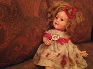 A Shirley Temple doll left behind by the ghostly child.  She didn't forget her Mickey Mouse doll however!